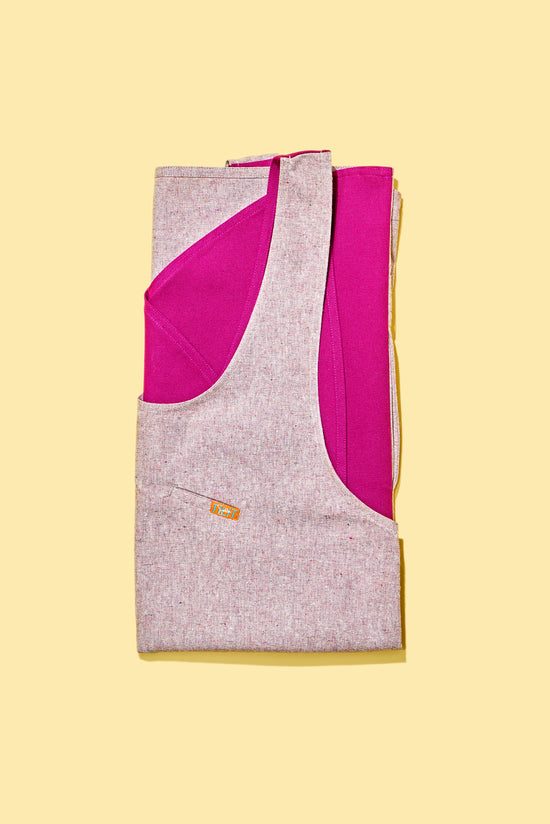 folded pink sohla smocked apron