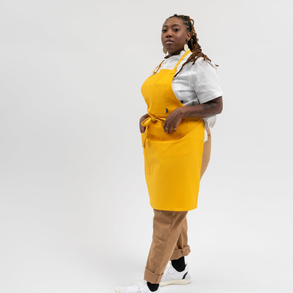 
                  
                    TILIT's yellow apron for the color splash apron of the month
                  
                