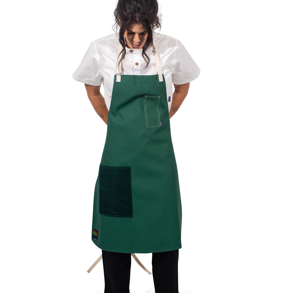TILIT Green Apron with white straps a chest pocket and a mesh hip pocket