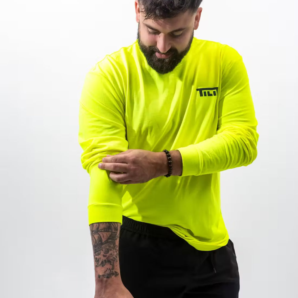 
                  
                    “Run the Pass” Long Sleeve Soft Cotton T-Shirt in Neon Yellow
                  
                