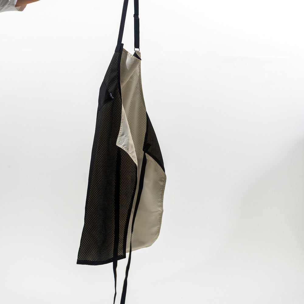 
                  
                    TILIT "Run The Pass" Mesh Apron in Black 
                  
                