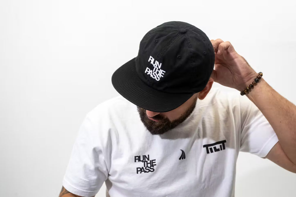 “Run the Pass” Street Cap with an Adjustable Strap