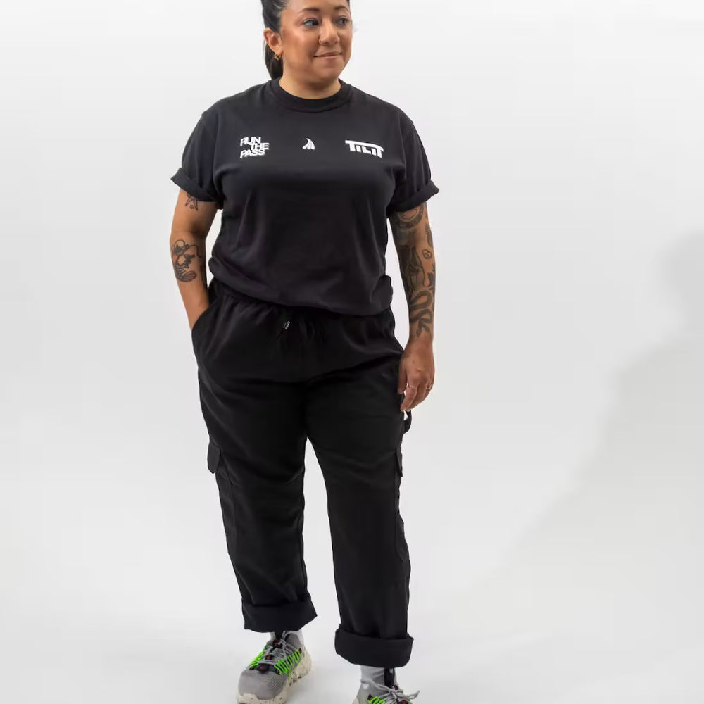 
                  
                    “Run the Pass” Short Sleeve T-shirt with Iconic Graphic
                  
                