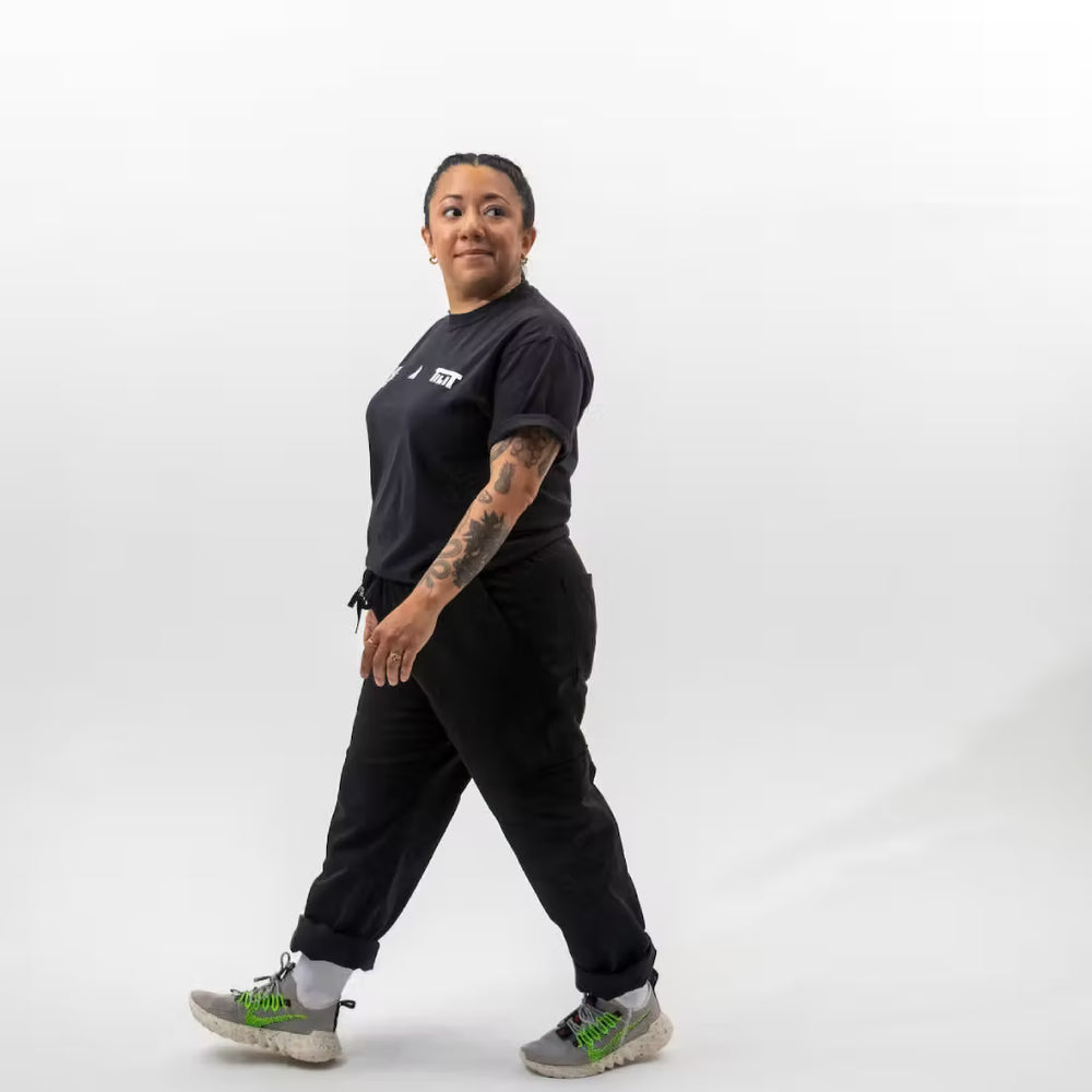 
                  
                    “Run the Pass” Short Sleeve T-shirt with Iconic Graphic
                  
                