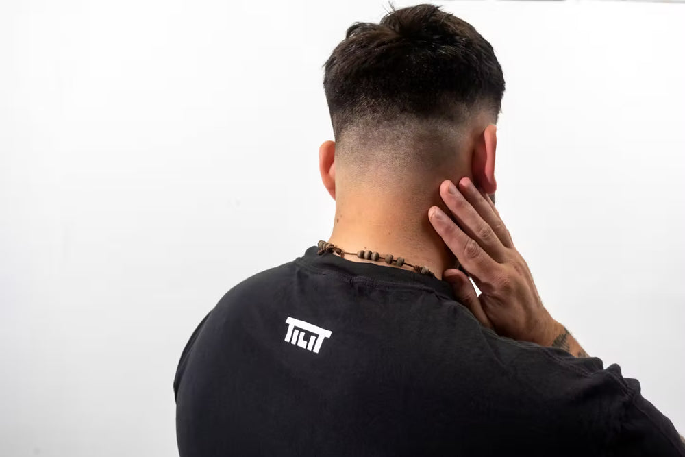 
                  
                    “Run the Pass” Short Sleeve T-shirt with Iconic Graphic
                  
                