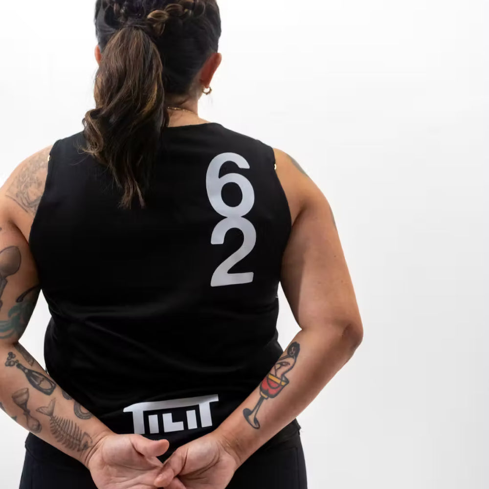 
                  
                    “Run The Pass” Women's Moisture Wicking Hydrotech Singlet
                  
                