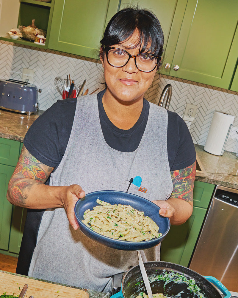 cooking food in sohla smocked apron