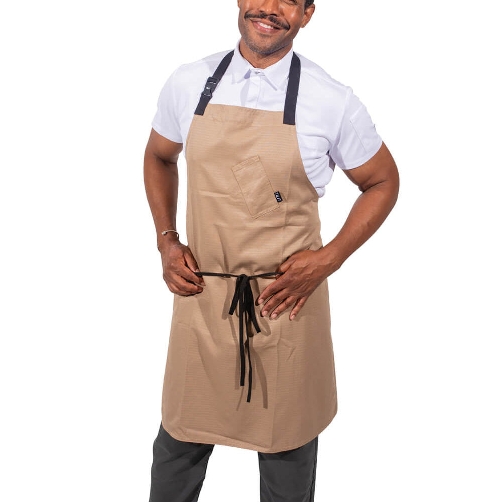 
                  
                    Man wearing a beige apron on a white background
                  
                