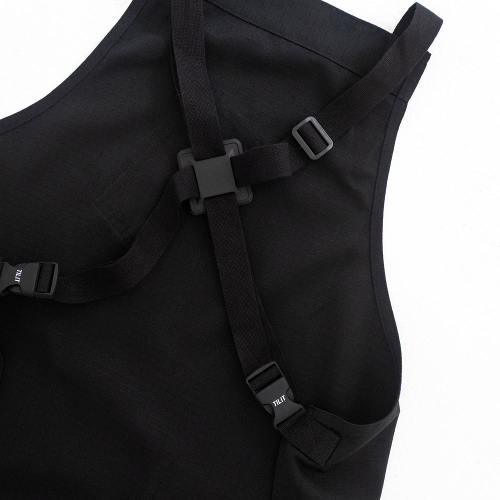 
                  
                    TILIT Supply Cross Back Apron in Black
                  
                
