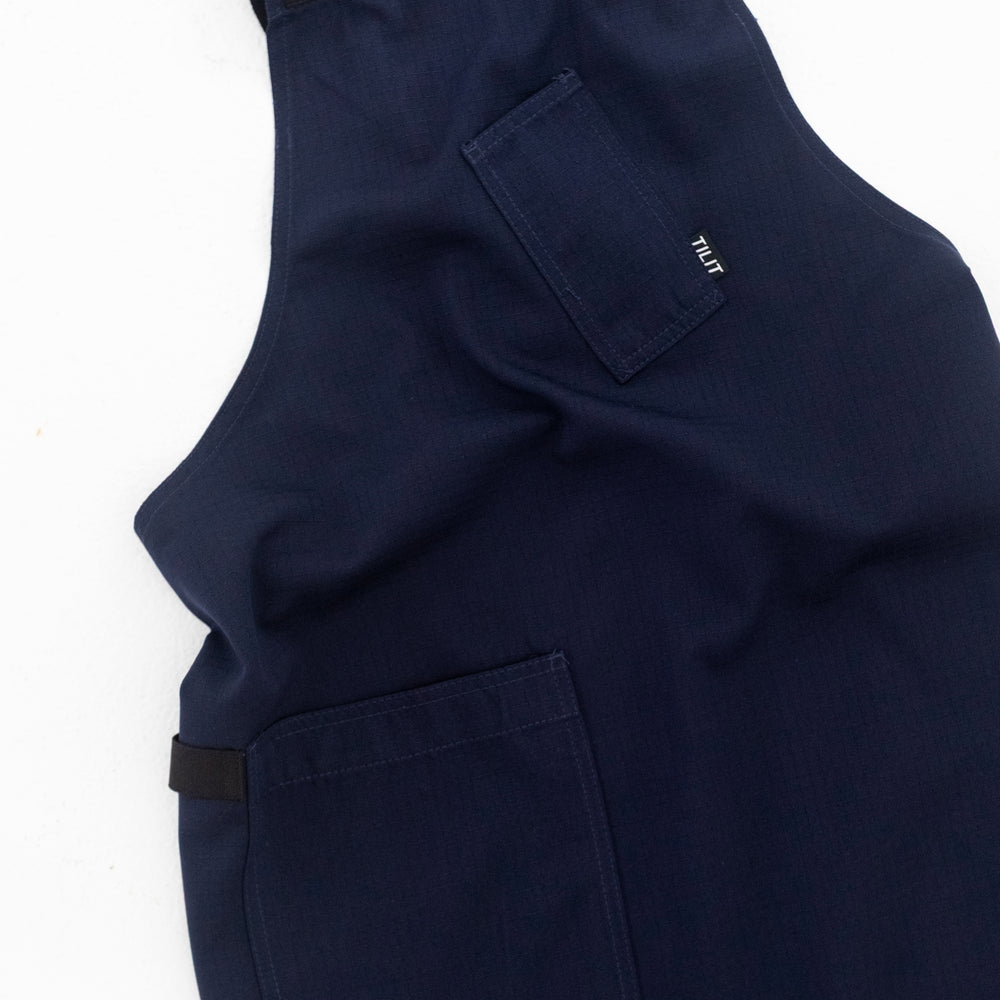 
                  
                    TILIT Supply Cross Back Apron in Navy
                  
                
