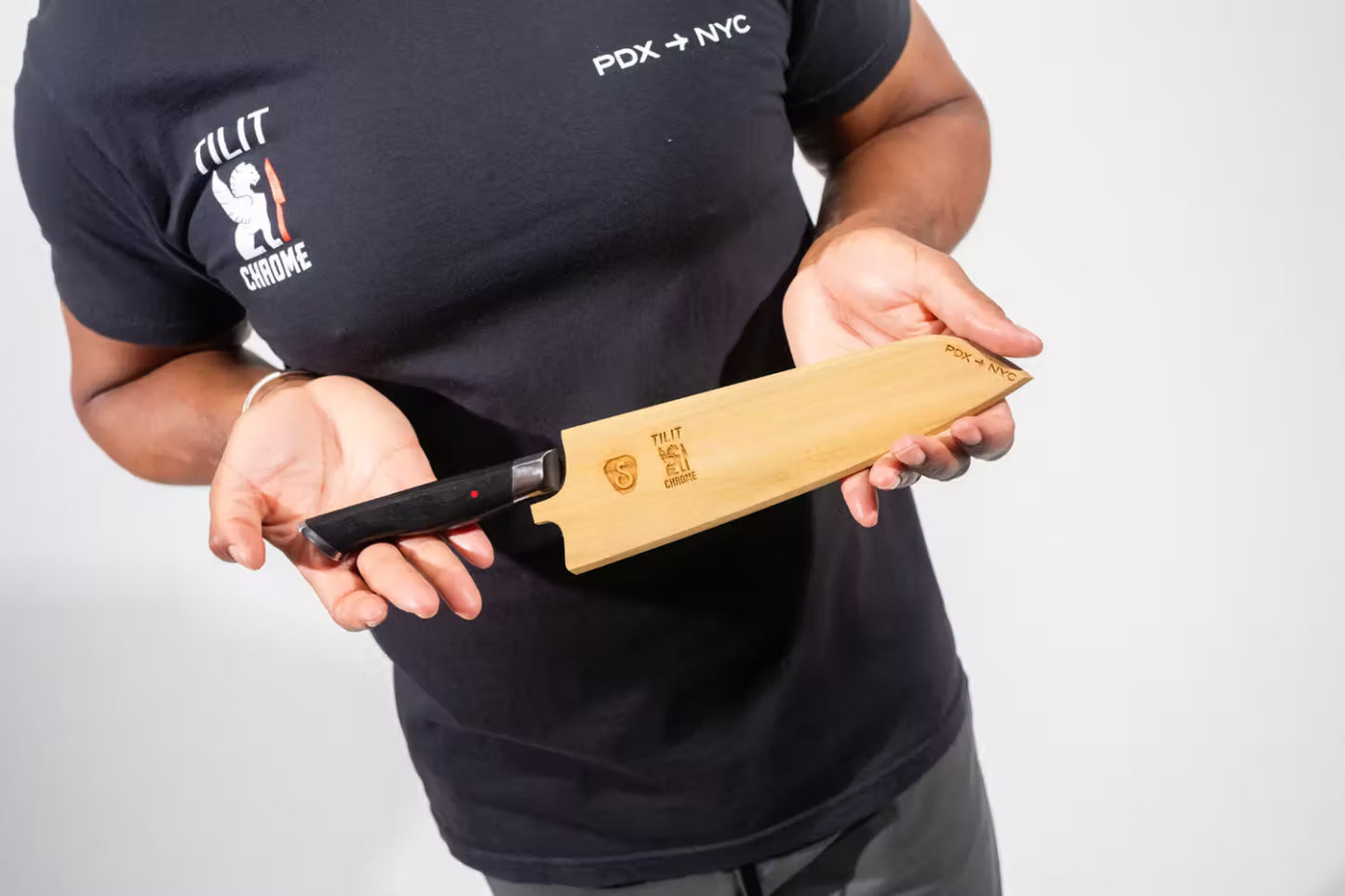 Person holding a 8" knife 