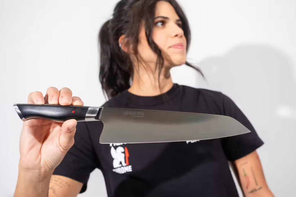 
                  
                    Person holding a 8" knife 
                  
                