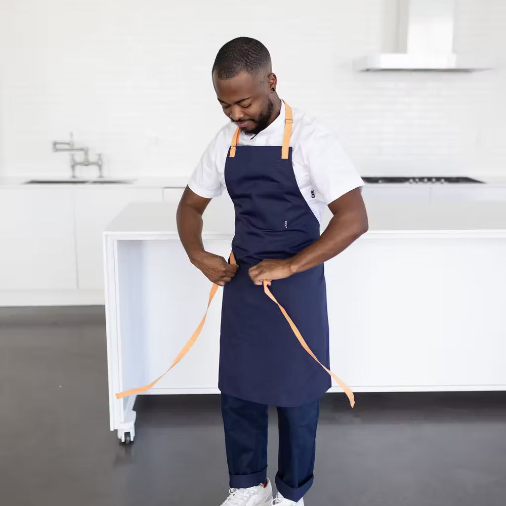 
                  
                    TILIT x Paola Velez Wrinkle Free Apron
                  
                