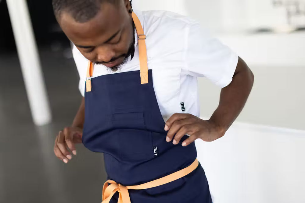 
                  
                    TILIT x Paola Velez Wrinkle Free Apron
                  
                